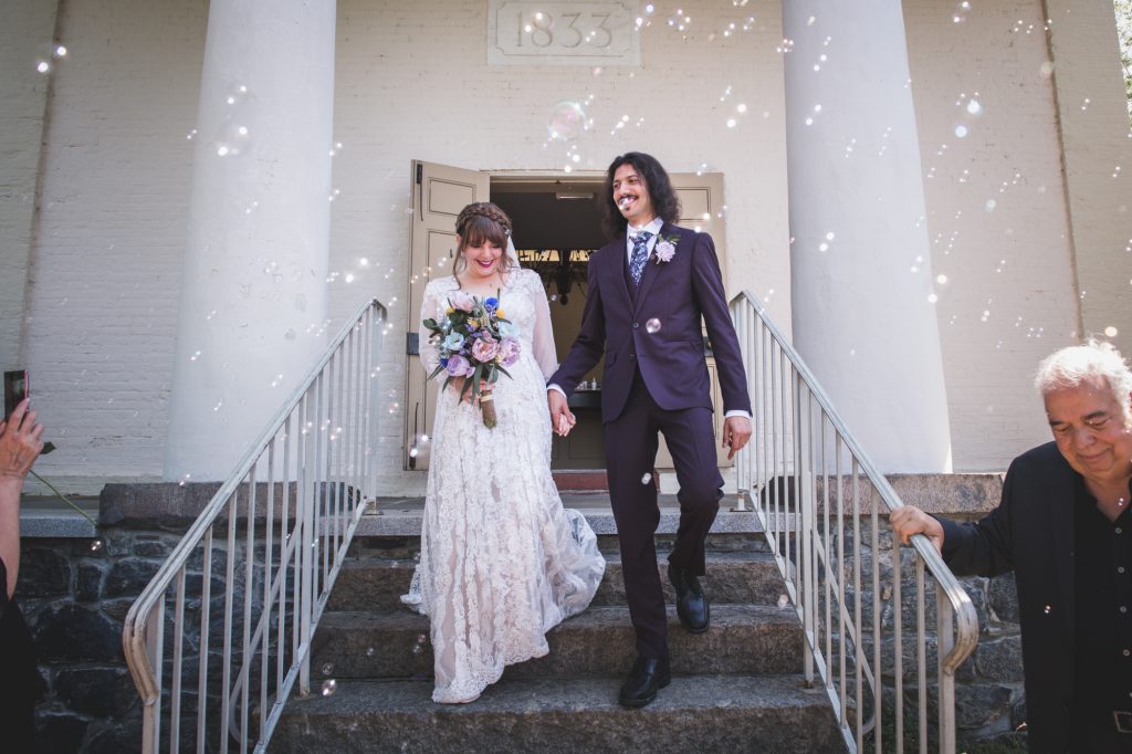 Wedding Couple leaving the Chapel Restoration in Cold Spring, NY