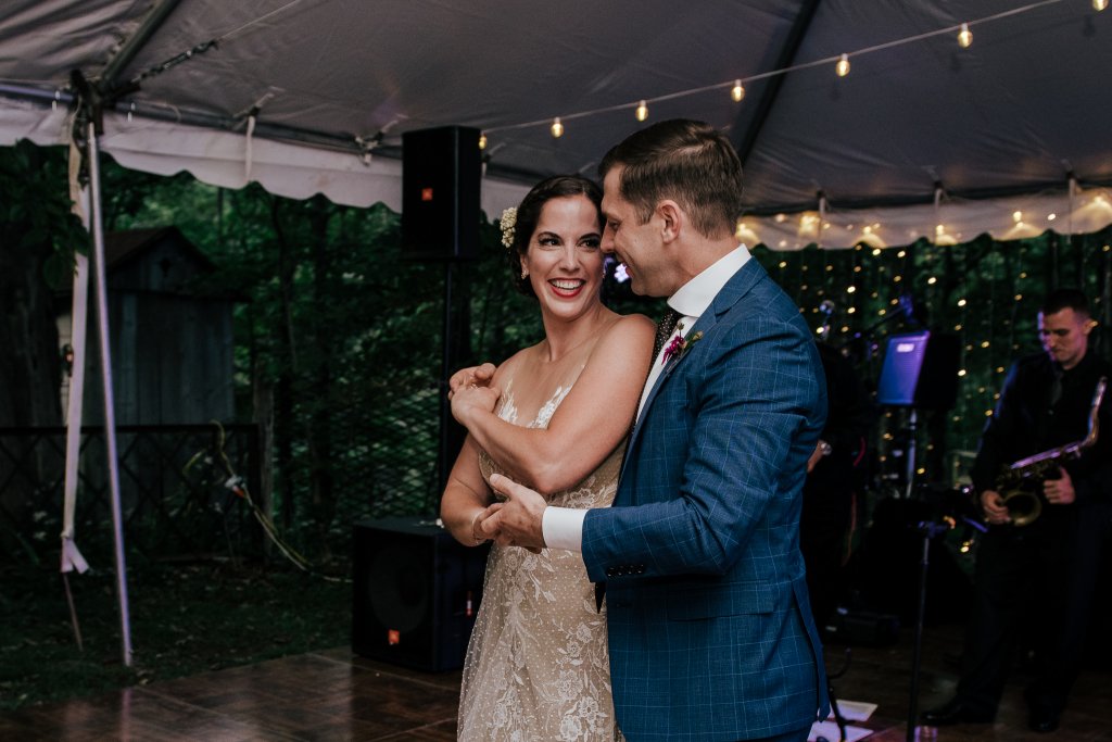 wedding photo of bride and groom dancing