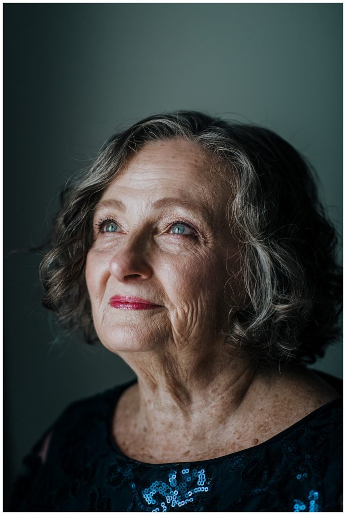 A Saratoga Springs SPAC Wedding 9 portrait of the bride's mother on her daughter's wedding day