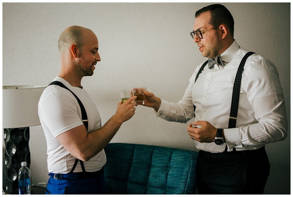 A Saratoga Springs SPAC Wedding 13 groom toasting before his saratoga springs wedding
