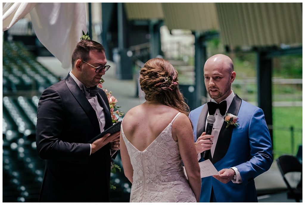 A Saratoga Springs SPAC Wedding 25 groom saying his vows at spac wedding ceremony