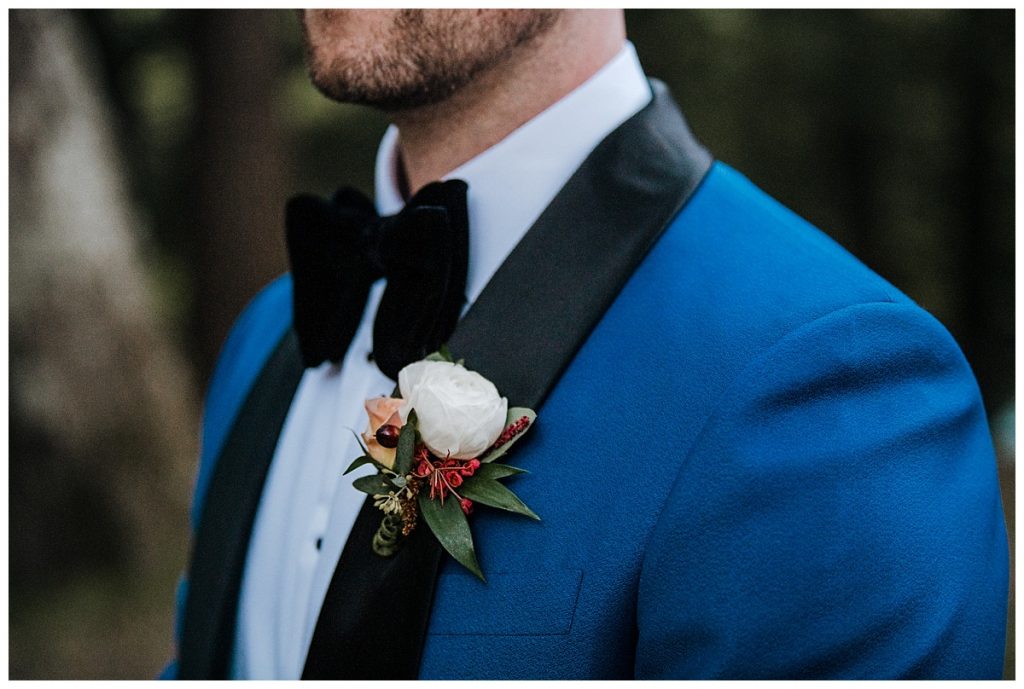A Saratoga Springs SPAC Wedding 53 groom boutneer detail at a saratoga springs wedding