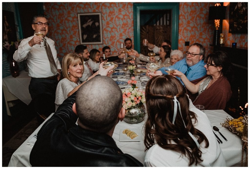cheers at a Old Stone House Inn Wedding