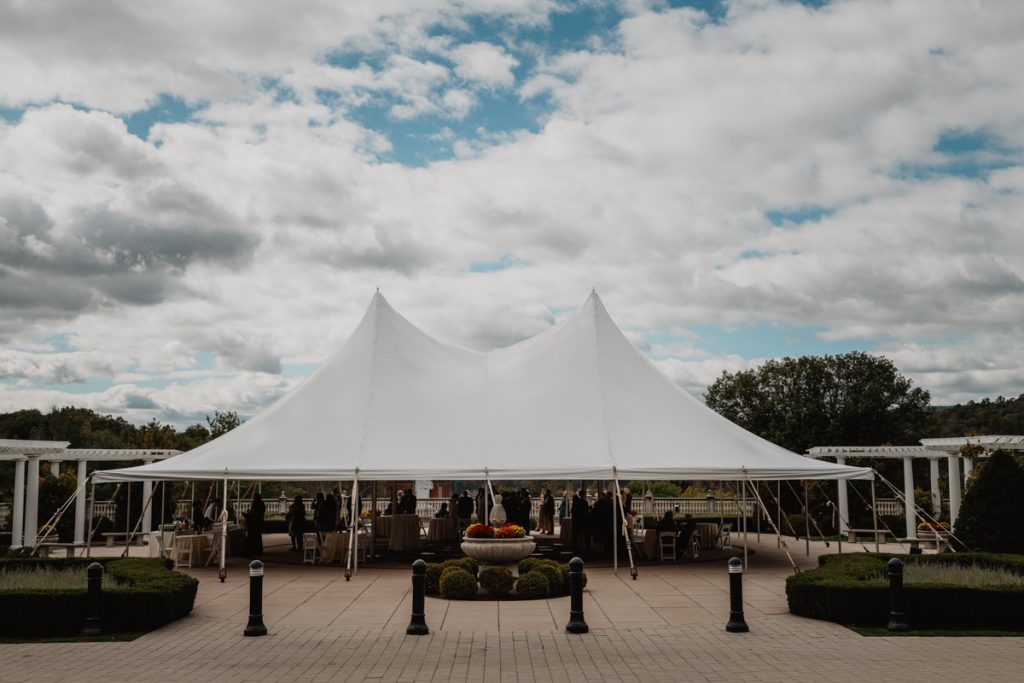 Anton Plaza cocktail hour under a tent at Culinary Institute Of America (CIA) Hyde Park wedding