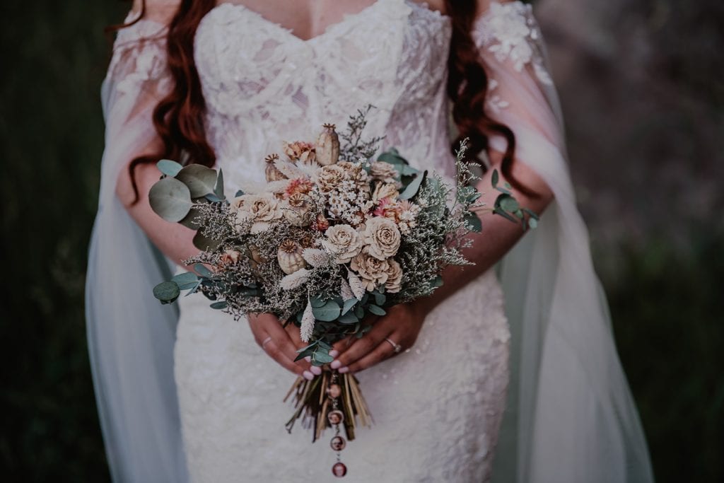 4 Reasons to Love a Bear Mountain Wedding 23 bridal floral arrangement dark and moody photographer