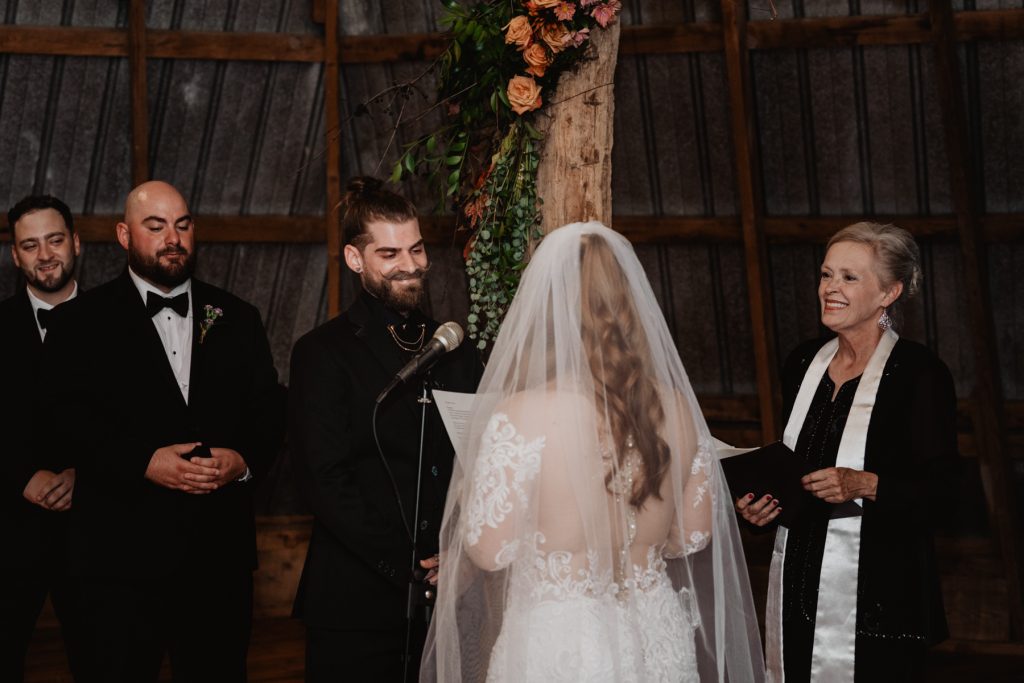 wedding ceremony at The Stone Barn at Beardslee Farm Wedding