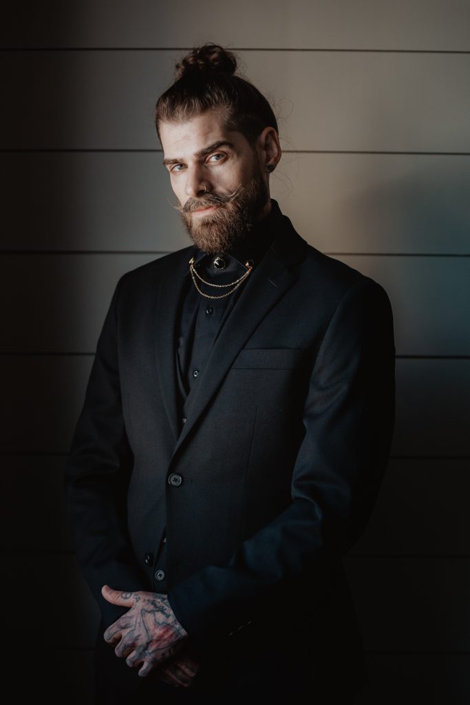 dark and moody groom portrait
